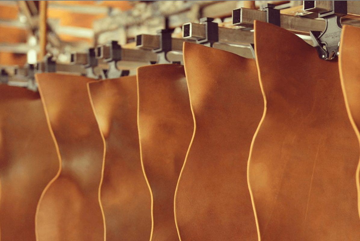Vegetable-tanned premium Italian leather at the tannery, hanging
