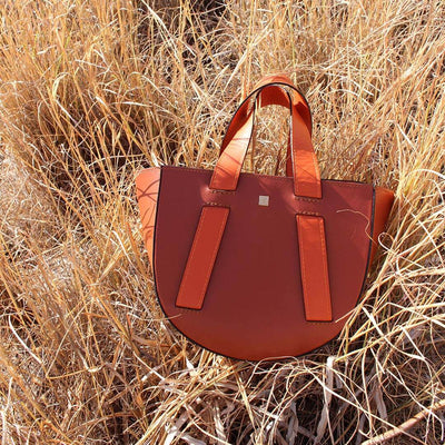 italian leather handbag in terracotta and orange leathers