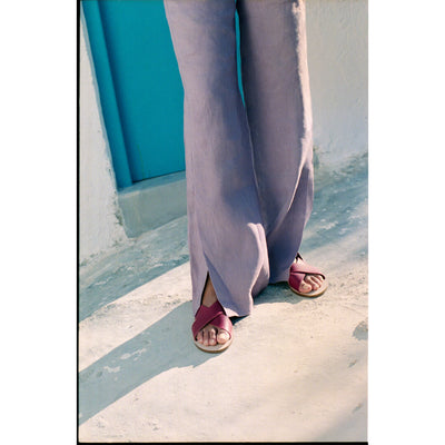 woman wearing greek leather sandals, italian leather slides, #color_berry